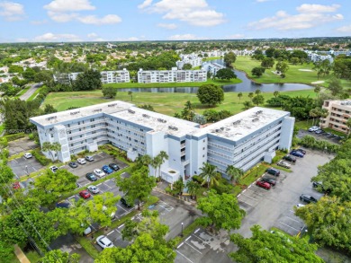 Welcome to a stunning corner Unit 2 bedrooms and 2 bathrooms on Oriole Golf and Tennis Club in Florida - for sale on GolfHomes.com, golf home, golf lot
