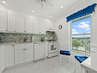 Welcome to a stunning corner Unit 2 bedrooms and 2 bathrooms on Oriole Golf and Tennis Club in Florida - for sale on GolfHomes.com, golf home, golf lot