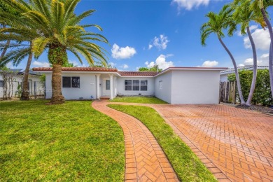 Located in the guard-gated community of Normandy Shores, this on Normandy Shores Golf Course in Florida - for sale on GolfHomes.com, golf home, golf lot