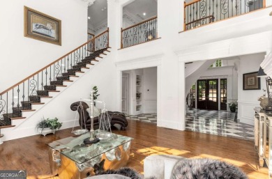 Step into timeless sophistication and grand-scale living in this on TPC At Sugarloaf Golf Club in Georgia - for sale on GolfHomes.com, golf home, golf lot