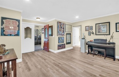 Under contract-accepting backup offers. This well-appointed on Highland Lakes Executive Golf Course in Florida - for sale on GolfHomes.com, golf home, golf lot