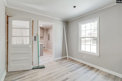 Welcome home to a single-level living space, a custom-built on The Woodlands Country Club in South Carolina - for sale on GolfHomes.com, golf home, golf lot