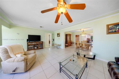 Located in the guard-gated community of Normandy Shores, this on Normandy Shores Golf Course in Florida - for sale on GolfHomes.com, golf home, golf lot