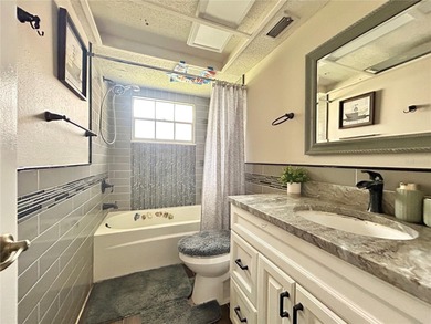 This 3-bedroom, 2-bathroom, 2-car garage, pool property is on Beacon Woods Golf Club in Florida - for sale on GolfHomes.com, golf home, golf lot