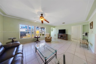 Located in the guard-gated community of Normandy Shores, this on Normandy Shores Golf Course in Florida - for sale on GolfHomes.com, golf home, golf lot