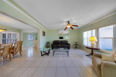 Located in the guard-gated community of Normandy Shores, this on Normandy Shores Golf Course in Florida - for sale on GolfHomes.com, golf home, golf lot