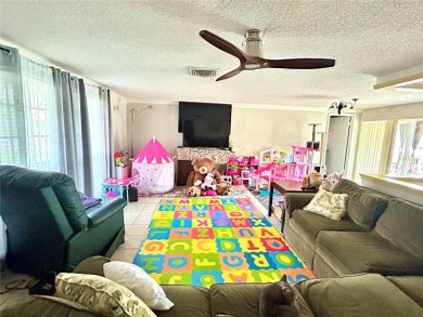This 3-bedroom, 2-bathroom, 2-car garage, pool property is on Beacon Woods Golf Club in Florida - for sale on GolfHomes.com, golf home, golf lot