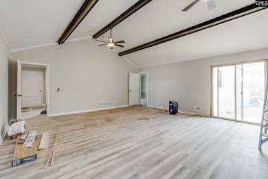 Welcome home to a single-level living space, a custom-built on The Woodlands Country Club in South Carolina - for sale on GolfHomes.com, golf home, golf lot