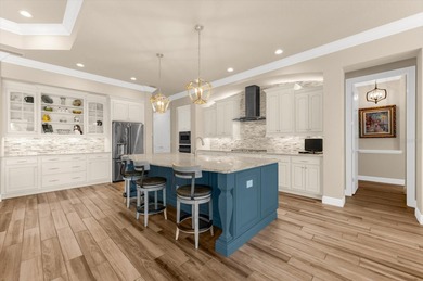 Welcome to the epitome of luxury living in Country Club East! on Ritz-Carlton Members Golf Club in Florida - for sale on GolfHomes.com, golf home, golf lot