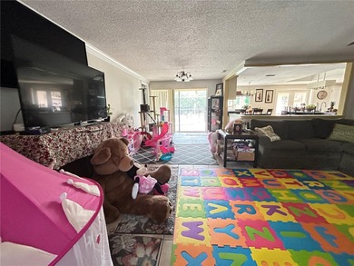 This 3-bedroom, 2-bathroom, 2-car garage, pool property is on Beacon Woods Golf Club in Florida - for sale on GolfHomes.com, golf home, golf lot