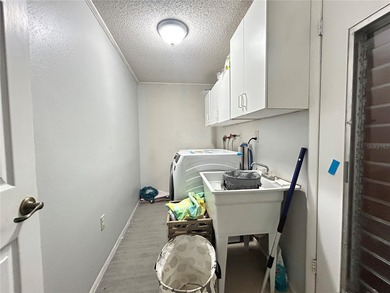 This 3-bedroom, 2-bathroom, 2-car garage, pool property is on Beacon Woods Golf Club in Florida - for sale on GolfHomes.com, golf home, golf lot