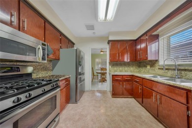 Located in the guard-gated community of Normandy Shores, this on Normandy Shores Golf Course in Florida - for sale on GolfHomes.com, golf home, golf lot