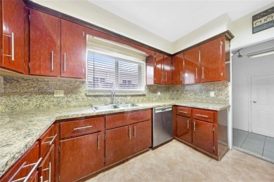 Located in the guard-gated community of Normandy Shores, this on Normandy Shores Golf Course in Florida - for sale on GolfHomes.com, golf home, golf lot