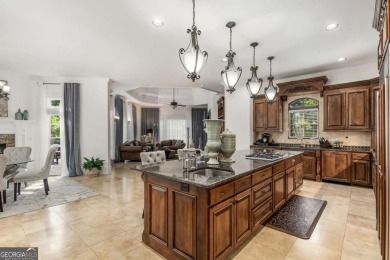 Step into timeless sophistication and grand-scale living in this on TPC At Sugarloaf Golf Club in Georgia - for sale on GolfHomes.com, golf home, golf lot