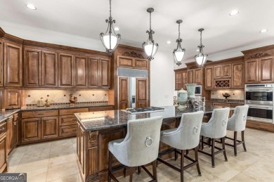 Step into timeless sophistication and grand-scale living in this on TPC At Sugarloaf Golf Club in Georgia - for sale on GolfHomes.com, golf home, golf lot