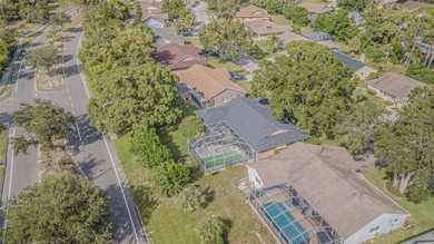 This 3-bedroom, 2-bathroom, 2-car garage, pool property is on Beacon Woods Golf Club in Florida - for sale on GolfHomes.com, golf home, golf lot