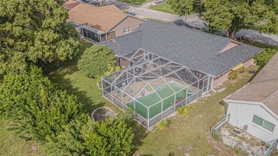 This 3-bedroom, 2-bathroom, 2-car garage, pool property is on Beacon Woods Golf Club in Florida - for sale on GolfHomes.com, golf home, golf lot