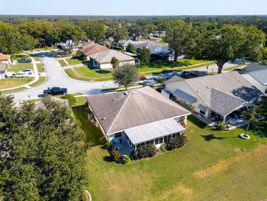 Under contract-accepting backup offers. This well-appointed on Highland Lakes Executive Golf Course in Florida - for sale on GolfHomes.com, golf home, golf lot