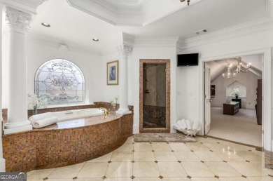Step into timeless sophistication and grand-scale living in this on TPC At Sugarloaf Golf Club in Georgia - for sale on GolfHomes.com, golf home, golf lot