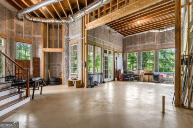 Step into timeless sophistication and grand-scale living in this on TPC At Sugarloaf Golf Club in Georgia - for sale on GolfHomes.com, golf home, golf lot