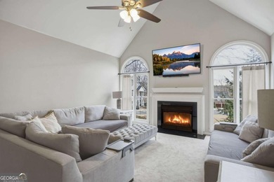 Welcome to this 5-bedroom home that sits on a corner lot and on Towne Lake Hills Golf Club in Georgia - for sale on GolfHomes.com, golf home, golf lot