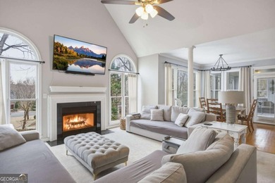 Welcome to this 5-bedroom home that sits on a corner lot and on Towne Lake Hills Golf Club in Georgia - for sale on GolfHomes.com, golf home, golf lot