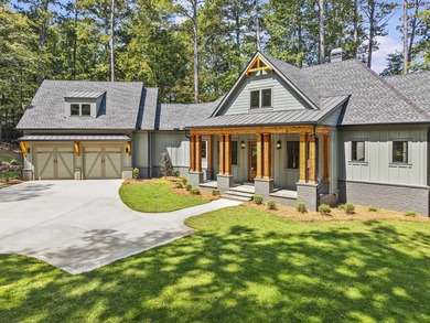 Stunning Lakefront Luxury Home in Reynolds Landing with Sunset on Reynolds Lake Oconee - The Landing in Georgia - for sale on GolfHomes.com, golf home, golf lot