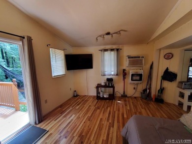 Great little cabin in a waterfront community. Begin your journey on River Ridge Golf Club in Virginia - for sale on GolfHomes.com, golf home, golf lot