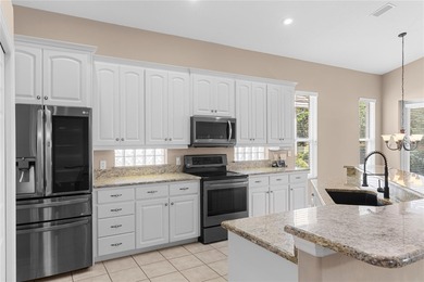 FABULOUS *MAGNOLIA* plan home in the Turnberry community of on Grasslands Golf and Country Club in Florida - for sale on GolfHomes.com, golf home, golf lot