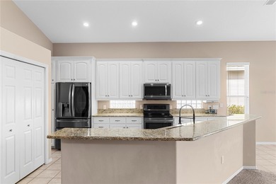 FABULOUS *MAGNOLIA* plan home in the Turnberry community of on Grasslands Golf and Country Club in Florida - for sale on GolfHomes.com, golf home, golf lot