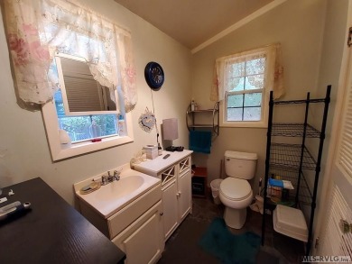 Great little cabin in a waterfront community. Begin your journey on River Ridge Golf Club in Virginia - for sale on GolfHomes.com, golf home, golf lot