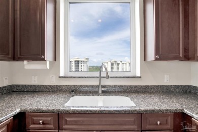 Breathtaking 8th-Floor Corner Unit with Panoramic Water Views | on Lost Key Golf Club in Florida - for sale on GolfHomes.com, golf home, golf lot
