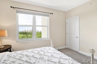 Breathtaking 8th-Floor Corner Unit with Panoramic Water Views | on Lost Key Golf Club in Florida - for sale on GolfHomes.com, golf home, golf lot
