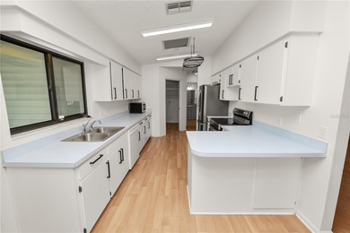 Welcome to this well maintained 2 bedroom, 2 bath home located on Highland Fairways Golf Club in Florida - for sale on GolfHomes.com, golf home, golf lot