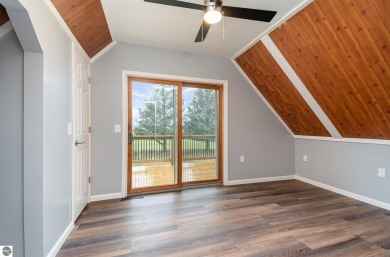 BETTER THAN NEW! Take a look at this sharp 3-bedroom Chalet at on The Pines Golf Course at Lake Isabella in Michigan - for sale on GolfHomes.com, golf home, golf lot