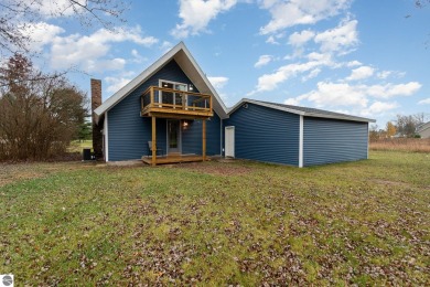 BETTER THAN NEW! Take a look at this sharp 3-bedroom Chalet at on The Pines Golf Course at Lake Isabella in Michigan - for sale on GolfHomes.com, golf home, golf lot