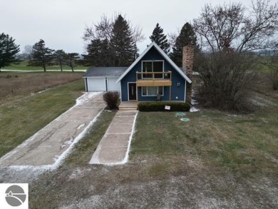 BETTER THAN NEW! Take a look at this sharp 3-bedroom Chalet at on The Pines Golf Course at Lake Isabella in Michigan - for sale on GolfHomes.com, golf home, golf lot