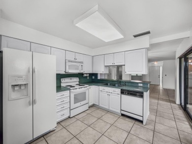 1st floor, 2BR+DEN/2BTH condo featuring amazing golf views of on Martin Downs Country Club in Florida - for sale on GolfHomes.com, golf home, golf lot