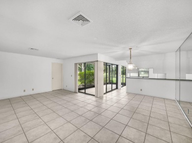 1st floor, 2BR+DEN/2BTH condo featuring amazing golf views of on Martin Downs Country Club in Florida - for sale on GolfHomes.com, golf home, golf lot