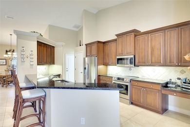 The *Savannah* by Rosecorp Homes-- beautiful *Great Room* floor on River Wilderness Golf and Country Club in Florida - for sale on GolfHomes.com, golf home, golf lot