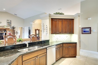 The *Savannah* by Rosecorp Homes-- beautiful *Great Room* floor on River Wilderness Golf and Country Club in Florida - for sale on GolfHomes.com, golf home, golf lot