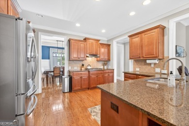 Located within the exclusive Reunion Country Club, this on Reunion Golf Club in Georgia - for sale on GolfHomes.com, golf home, golf lot