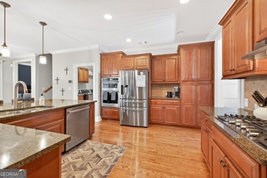 Located within the exclusive Reunion Country Club, this on Reunion Golf Club in Georgia - for sale on GolfHomes.com, golf home, golf lot