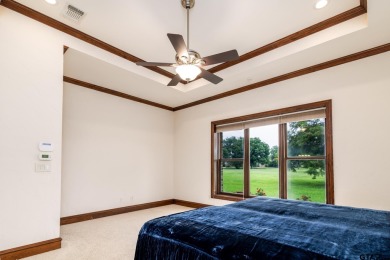 This beautiful custom home on the golf course in Hideaway Lake on Hide-A-Way Lake Golf Course in Texas - for sale on GolfHomes.com, golf home, golf lot