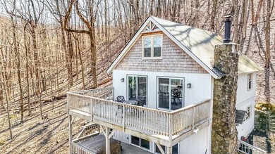 This updated 4-bedroom, 3-bath home is tucked into the Bent Tree on Bent Tree Golf Course in Georgia - for sale on GolfHomes.com, golf home, golf lot