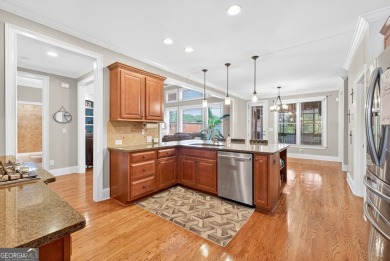 Located within the exclusive Reunion Country Club, this on Reunion Golf Club in Georgia - for sale on GolfHomes.com, golf home, golf lot