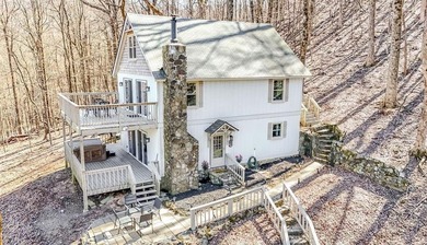 This updated 4-bedroom, 3-bath home is tucked into the Bent Tree on Bent Tree Golf Course in Georgia - for sale on GolfHomes.com, golf home, golf lot