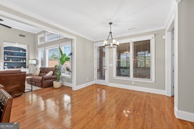 Located within the exclusive Reunion Country Club, this on Reunion Golf Club in Georgia - for sale on GolfHomes.com, golf home, golf lot