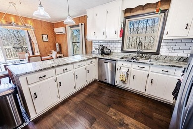 This updated 4-bedroom, 3-bath home is tucked into the Bent Tree on Bent Tree Golf Course in Georgia - for sale on GolfHomes.com, golf home, golf lot