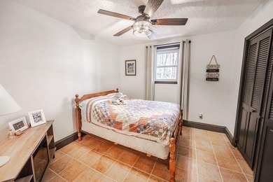 This updated 4-bedroom, 3-bath home is tucked into the Bent Tree on Bent Tree Golf Course in Georgia - for sale on GolfHomes.com, golf home, golf lot